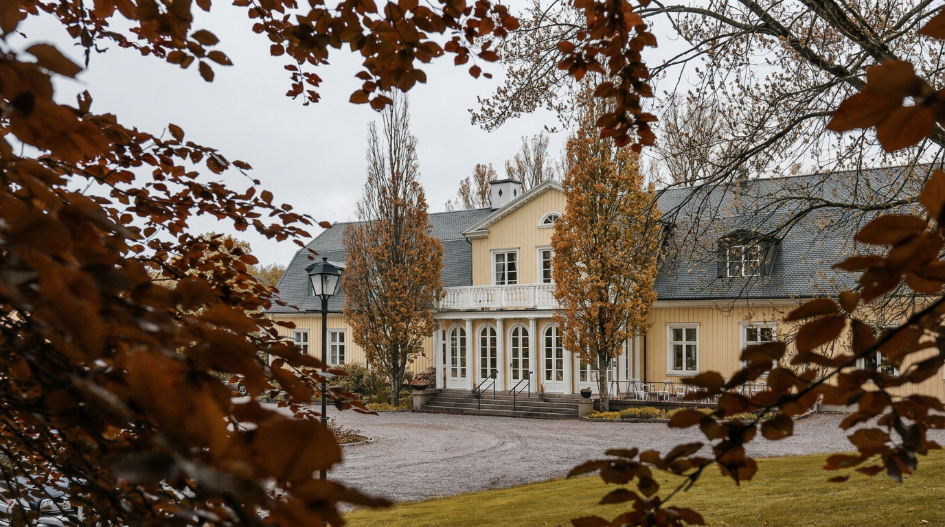 Historic Swedish manor house surrounded by autumn forest, used as a luxury hunting retreat
